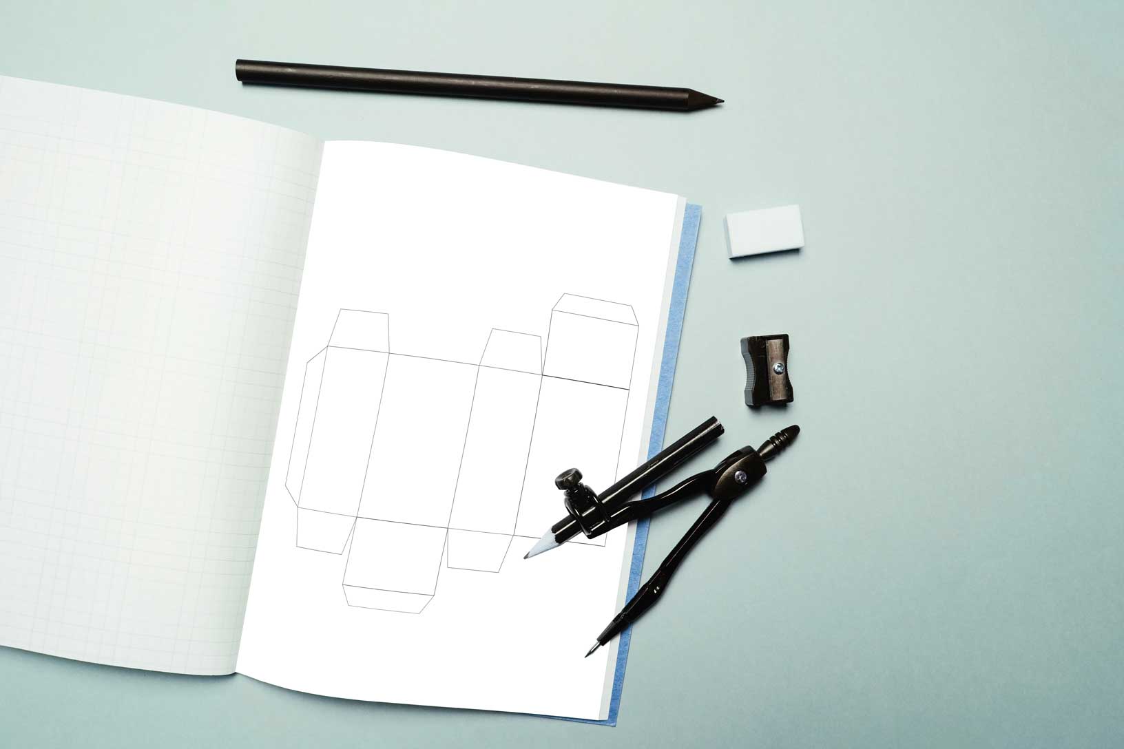 Box dieline sketch in notebook